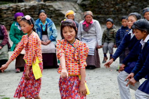 Some of the village children dance to the song, "...slowly, slowly, slowly..." Photo Credit: Christen Babb
